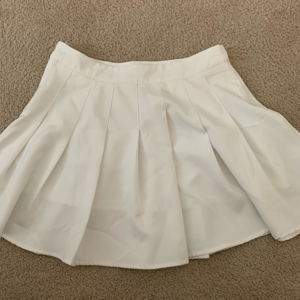 White pleated skirt